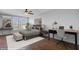 Bright bedroom with desk area and a large window at 259 E Bay St # 7C, Charleston, SC 29401