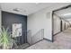 The carpeted hallways of this apartment are bright, clean, and decorated with modern art at 259 E Bay St # 7C, Charleston, SC 29401