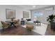 Bright and modern living room with dining area and balcony access at 259 E Bay St # 7C, Charleston, SC 29401