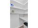 A pantry with white shelves and a marble countertop at 259 E Bay St # 7C, Charleston, SC 29401