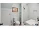 Modern bathroom with glass-enclosed shower and classic white subway tile at 293 Grove St, Charleston, SC 29403