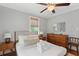 Bedroom featuring a ceiling fan, neutral tones, and a comfortable bed at 293 Grove St, Charleston, SC 29403