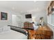 Comfortable bedroom with hardwood floors, a work area, and a closet at 293 Grove St, Charleston, SC 29403