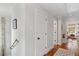 Bright hallway with wood floors leading to a bedroom, for a cozy feel at 293 Grove St, Charleston, SC 29403