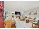 Bright and airy living room featuring hardwood floors, neutral furniture, and stylish decor at 293 Grove St, Charleston, SC 29403