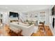 Spacious living room filled with natural light, hardwood floors, and cozy seating arrangements at 293 Grove St, Charleston, SC 29403