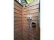 Enclosed outdoor shower space with wood paneling and a refreshing showerhead, perfect for rinsing off after outdoor activities at 293 Grove St, Charleston, SC 29403