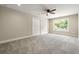 Bedroom with carpet, ceiling fan, natural light, and closet at 2960 Blackfish Rd, Johns Island, SC 29455