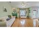Comfortable living room with fireplace, neutral paint, and hardwood floors at 300 Foxglove Ave, Summerville, SC 29483
