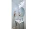Clean half bathroom featuring updated fixtures and a classic vanity at 300 Foxglove Ave, Summerville, SC 29483