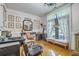 Salon with styling stations, hardwood floors, bench seating, and natural light at 300 Foxglove Ave, Summerville, SC 29483