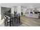 Bright and airy dining room open to the living area at 313 Runnymede Ln, Summerville, SC 29485