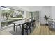 Bright dining room featuring a large window with outdoor views at 313 Runnymede Ln, Summerville, SC 29485