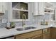 Updated kitchen featuring quartz countertop, and natural lighting at 313 Runnymede Ln, Summerville, SC 29485