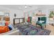 Cozy living room featuring stylish furnishings and a decorative fireplace at 313 Runnymede Ln, Summerville, SC 29485