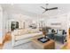 Bright living area with stylish seating and a seamless flow to the dining and kitchen spaces at 34 Eugenia Ave # B, Kiawah Island, SC 29455