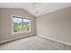 Carpeted bedroom with beige walls and a single window for natural light at 3588 Bagley Dr, Mount Pleasant, SC 29466