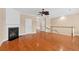 Spacious living room with hardwood floors, fireplace, neutral walls, and a ceiling fan at 3588 Bagley Dr, Mount Pleasant, SC 29466