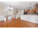 Spacious living room featuring hardwood floors, modern lighting fixtures, and elegant trim work at 3588 Bagley Dr, Mount Pleasant, SC 29466
