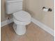 Close-up view of a standard white toilet with tile flooring and neutral walls at 3588 Bagley Dr, Mount Pleasant, SC 29466