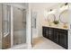 Bathroom with double vanity, modern fixtures, and tiled shower at 3636 Purple Martin Ct, Mount Pleasant, SC 29466