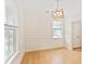Bright dining room featuring natural light, crown molding, and modern chandelier for elegant dining at 3636 Purple Martin Ct, Mount Pleasant, SC 29466