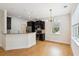 Open concept kitchen featuring dark cabinets, stainless steel appliances, and recessed lighting at 3636 Purple Martin Ct, Mount Pleasant, SC 29466
