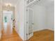 Hardwood floors lead to a bright office space with glass-paneled doors at 3636 Purple Martin Ct, Mount Pleasant, SC 29466
