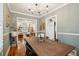 Inviting dining room with hardwood floors, chandelier, and a large wooden table for Gathering gatherings at 38 Colleton Dr, Charleston, SC 29407