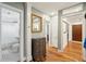 Hallway featuring hardwood floors, trim work, and access to rooms at 38 Colleton Dr, Charleston, SC 29407