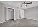 Bright bedroom featuring carpet flooring and ample closet space at 4054 Cedars Pkwy # C, North Charleston, SC 29420