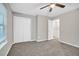 Bedroom with carpet flooring, a double closet and natural lighting at 4054 Cedars Pkwy # C, North Charleston, SC 29420