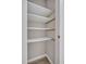 Open closet with white shelves for storage, perfect for organizing clothes and personal items at 4054 Cedars Pkwy # C, North Charleston, SC 29420