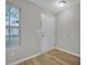 Bright entryway with wood-look floors, fresh paint, and a window for natural light at 4054 Cedars Pkwy # C, North Charleston, SC 29420