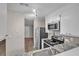 Bright kitchen features stainless steel appliances, granite countertops and a view to the front door at 4054 Cedars Pkwy # C, North Charleston, SC 29420
