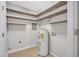 Spacious utility room featuring an efficient water heater and ample storage shelving at 4054 Cedars Pkwy # C, North Charleston, SC 29420