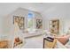 Charming attic room with a window seat, a play area, and cozy decor at 4246 Club Course Dr, North Charleston, SC 29420