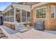 Backyard with covered porch, brick siding, and a patio area perfect for outdoor gatherings at 4246 Club Course Dr, North Charleston, SC 29420