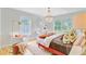 Bright bedroom with a chandelier, natural light, desk, decor, and a warm ambiance at 4246 Club Course Dr, North Charleston, SC 29420