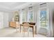 Bright bedroom featuring a desk area with natural light and a decorative wooden dresser at 4246 Club Course Dr, North Charleston, SC 29420