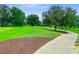 Scenic view of the well-maintained golf course with lush green fairways and mature trees at 4246 Club Course Dr, North Charleston, SC 29420