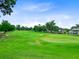 Picturesque golf course view with rolling greens and beautifully landscaped surroundings at 4246 Club Course Dr, North Charleston, SC 29420