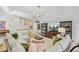 Bright and airy loft area with comfortable seating and a decorative chandelier at 4246 Club Course Dr, North Charleston, SC 29420