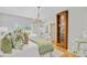 Bright bedroom features a king bed, hardwood floors, view of the backyard swimming pool at 4246 Club Course Dr, North Charleston, SC 29420