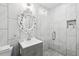 Elegant bathroom featuring stylish tiles, a modern vanity, and a glass-enclosed shower at 4939 Ashby Ave, North Charleston, SC 29405