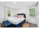 Comfortable bedroom with a queen-sized bed, natural light, and stylish decor at 4939 Ashby Ave, North Charleston, SC 29405