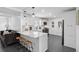 Bright kitchen with marble countertops, a breakfast bar, and modern appliances at 4939 Ashby Ave, North Charleston, SC 29405