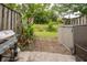Fenced backyard featuring a grill, shed, and green space, perfect for outdoor activities and relaxation at 507 Stinson Dr # B3, Charleston, SC 29407