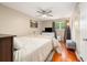 Cozy bedroom with ceiling fan, hardwood floors, and natural light from the window at 507 Stinson Dr # B3, Charleston, SC 29407