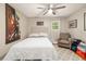 Comfortable bedroom with a ceiling fan, natural light, and a cozy seating area at 507 Stinson Dr # B3, Charleston, SC 29407